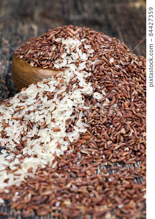 mixed rice of several types before cooking mixed rice of several types before cooking 84427359