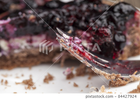 cake with butter cream and black currant jam cake with butter cream and black currant jam 84427924