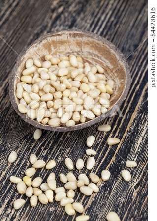 peeled pine nuts of small size peeled pine nuts of small size 84428616