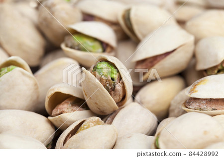 delicious and salty pistachio nuts delicious and salty pistachio nuts 84428992