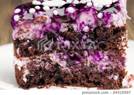 covered with blackberry jam chocolate cake with buttercream covered with blackberry jam chocolate cake with buttercream 84428997