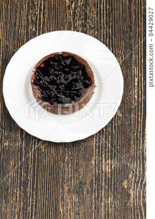 cake with butter cream and black currant jam cake with butter cream and black currant jam 84429027