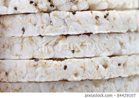 round rice loaves made from rice grains 84429107