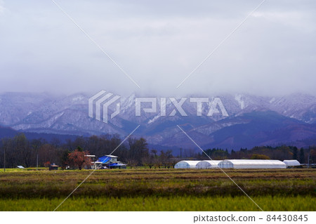 Mountains with snow on the top Satoyama early winter scenery 84430845