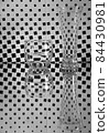 glasses with water and reflections on black and white checkered background 84430981