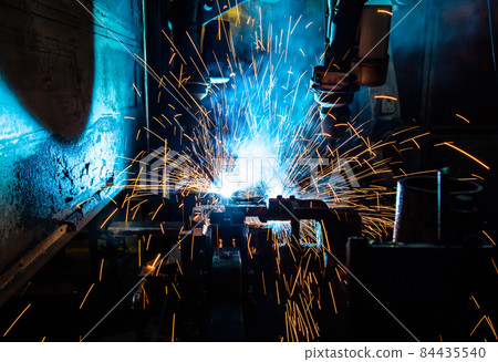 Welding robots movement in a car factory 84435540