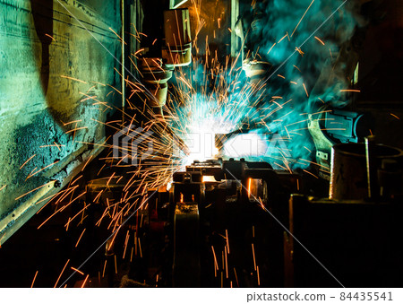 Welding robots movement in a car factory 84435541