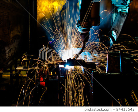 Welding robots movement in a car factory Welding robots movement in a car factory 84435542