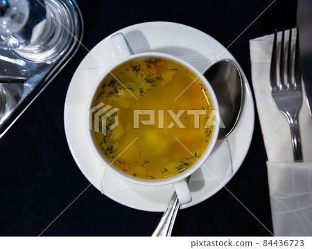 Appetizing soup with noodles and vegetables Appetizing soup with noodles and vegetables 84436723