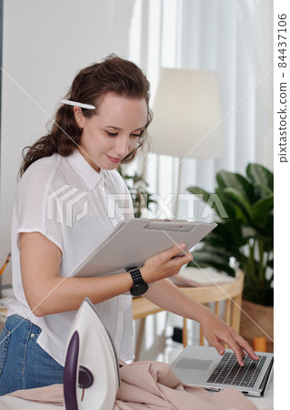 Female Entrepreneur Doing Work and Housework 84437106