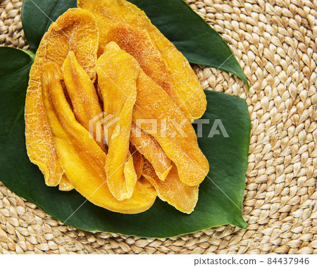 Dried mango slices Dried mango slices 84437946