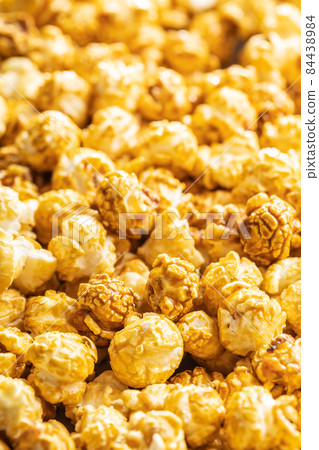 Lots of sweet caramel popcorn. Lots of sweet caramel popcorn. 84438984