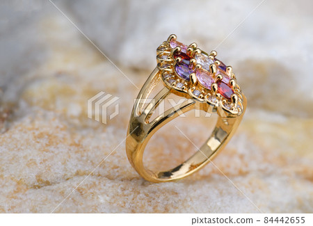 Gemstone jewelry golden ring. Gemstone jewelry golden ring. 84442655