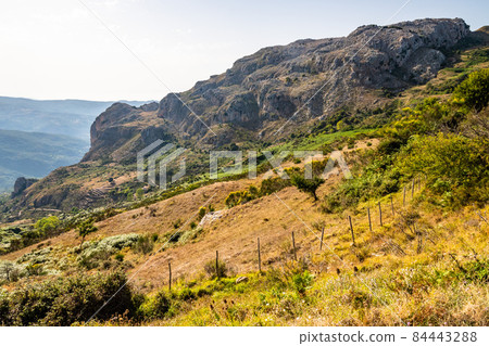 View of Rocca del Crasto near Alcara Li Fusi town in the Nebrodi Park, Sicily View of Rocca del Crasto near Alcara Li Fusi town in the Nebrodi Park, Sicily 84443288