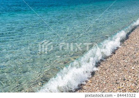 Pristine and calm Mediterranean sea water next to the shoreline, Sicily Pristine and calm Mediterranean sea water next to the shoreline, Sicily 84443322