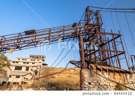 Abandoned sulphur mining complex Trabia Tallarita in Riesi, Sicily, Italy 84443418