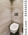 Interior of small clean restroom in miniature style 84444438