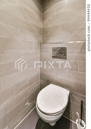 Interior of small clean restroom in miniature style 84444438