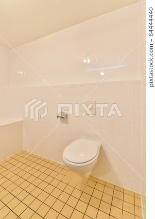Interior of small clean restroom in miniature style 84444440