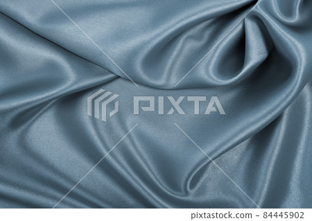 Smooth elegant dark grey silk or satin texture as abstract background. Luxurious background design Smooth elegant dark grey silk or satin texture as abstract background. Luxurious background design 84445902