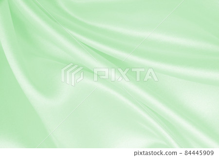 Smooth elegant green silk or satin luxury cloth texture as abstract background. Luxurious background design Smooth elegant green silk or satin luxury cloth texture as abstract background. Luxurious background design 84445909