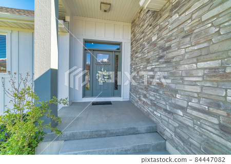 Exterior of an entrance of a house with contemporary design 84447082