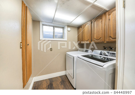 Laundry room interior craftsman's design and window Laundry room interior craftsman's design and window 84448997
