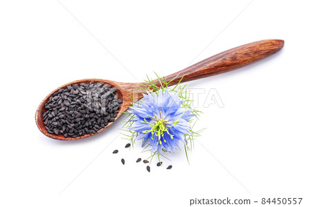Black cumin seed on white backgrounds. Black cumin seed on white backgrounds. 84450557