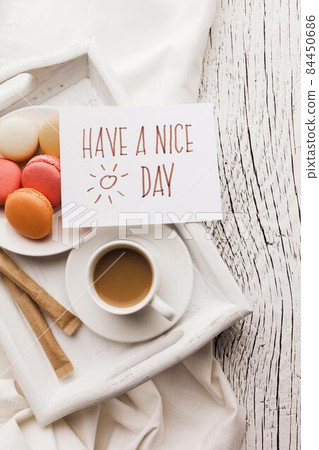 macarons breakfast cup coffee. High quality photo macarons breakfast cup coffee. High quality photo 84450686