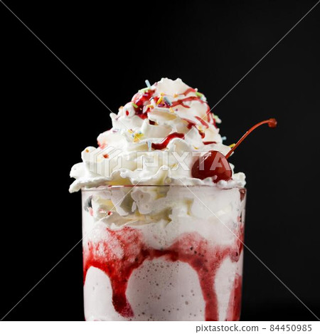 delicious strawberry milkshake beverage front view. High quality photo delicious strawberry milkshake beverage front view. High quality photo 84450985