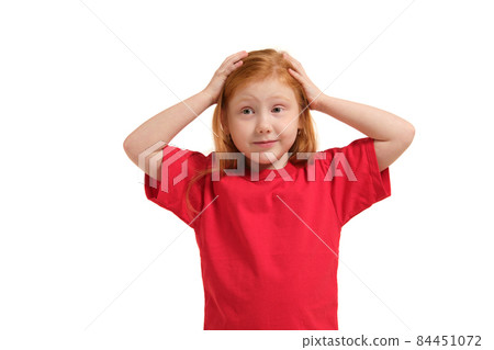 Portrait of cute redhead emotional little girl isolated on a white 84451072