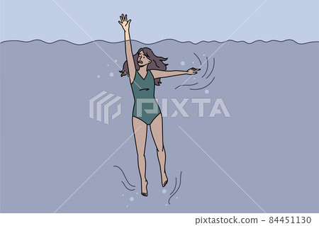Anxious woman ask for help drowning in sea 84451130