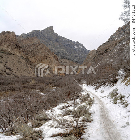 Provo Canyon snowy hiking trail in between the mountain slope at Utah 84451313