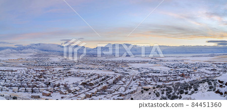 Top view of houses at Eagle Mountain in Utah against the view of Mount Timpanogos, Wasatch Mountains 84451360