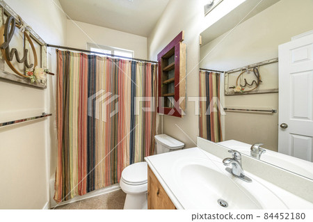 Bathroom with hand crafted wood display and shelves Bathroom with hand crafted wood display and shelves 84452180