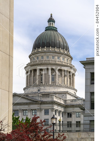 Famous landmark Utah State Capital Building against cloudy sky in Salt Lake City Famous landmark Utah State Capital Building against cloudy sky in Salt Lake City 84452984