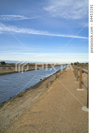 Wooden fence along water at Bolsa Chica Ecological Reserve in Huntington Beach 84453191