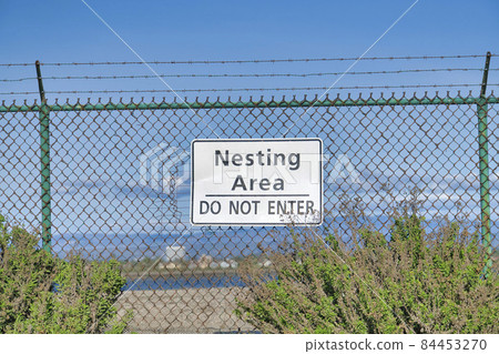 Nesting Area Do Not Enter warning sign at Bolsa Chica Ecological Reserve 84453270