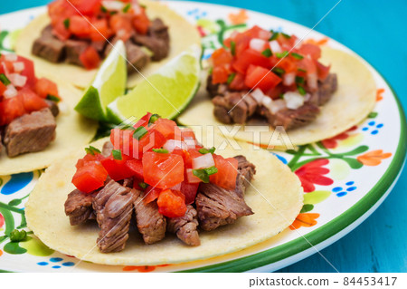 Delicious Mexican tacos Delicious Mexican tacos 84453417