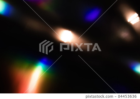 colorful rainbow crystal light leaks on black background 84453636