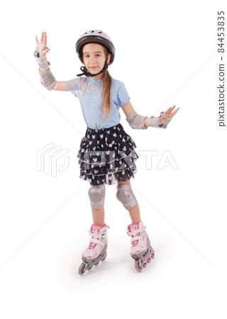 Little pretty girl on roller skates Little pretty girl on roller skates 84453835