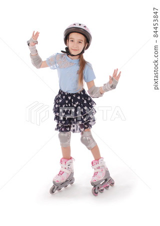 Little pretty girl on roller skates Little pretty girl on roller skates 84453847