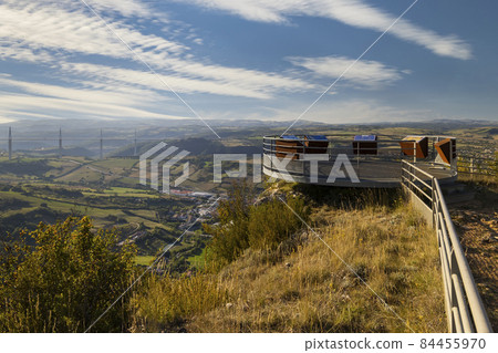 Look-out with Millau Viaduct across gorge valley of Tarn River, Aveyron Departement, France 84455970