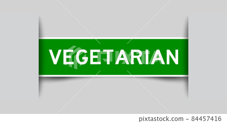 Inserted green color label sticker with word vegetarian on gray background Inserted green color label sticker with word vegetarian on gray background 84457416