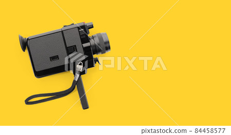 Super 8 movie camera isolated on yellow background. Copy space 84458577