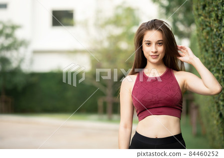 sporty woman standing outdoor sporty woman standing outdoor 84460252