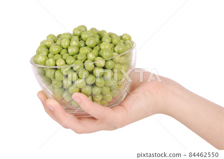 Fresh green peas in bowl isolated on white Fresh green peas in bowl isolated on white 84462550