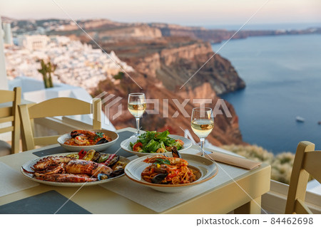 Dinner for two in a restaurant overlooking the sea 84462698