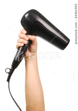 Hand holding hair dryer Hand holding hair dryer 84462993