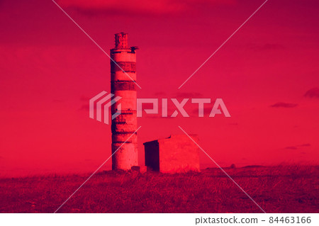 An ancient lighthouse on edge of a cliff. 84463166